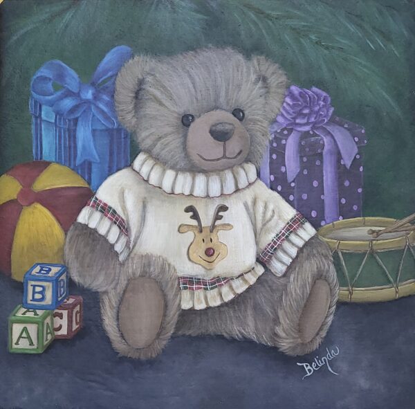 Gifts under the Christmas tree featuring a large teddy bear wearing a sweater.